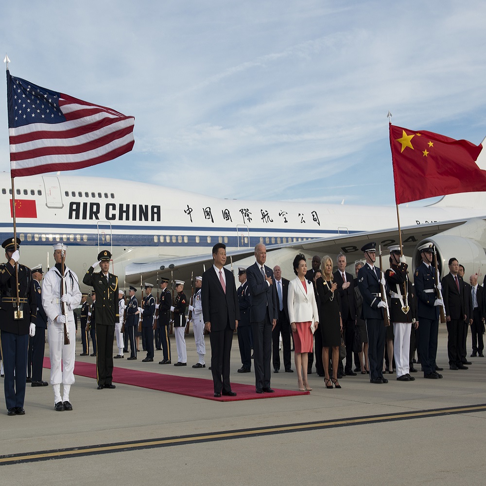 Joe Biden at the airport in China with President Xi Jinping